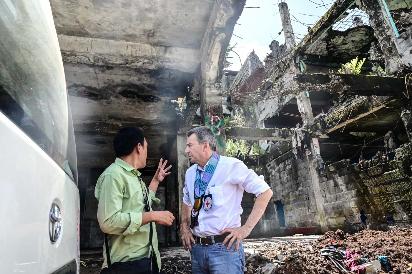 IN MARAWI. Maurer walks along the streets of the most affected area in Mawari City. Photo by Alecs Ongcal/ICRC  