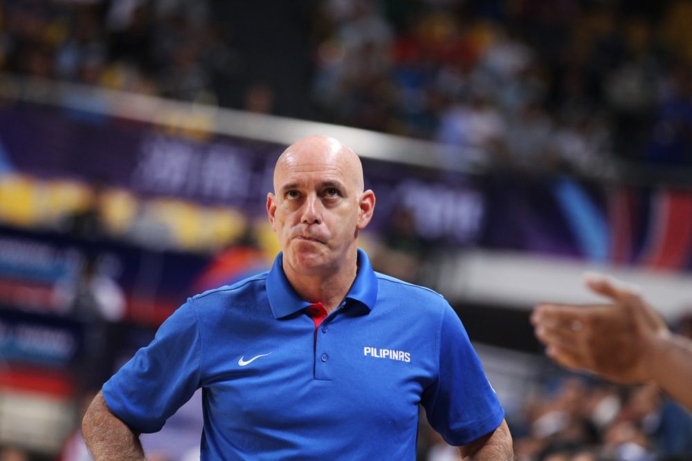 DEEP IN THOUGHT. Gilas head coach Tab Baldwin contemplates along the sidelines. Photo from FIBA 
