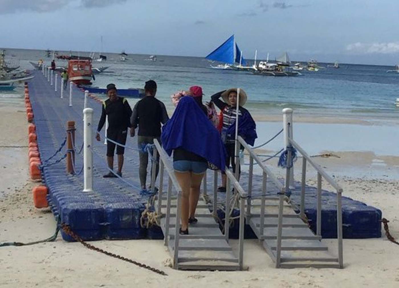 Malay town mayor, 10 other officials sued over Boracay pontoon fee