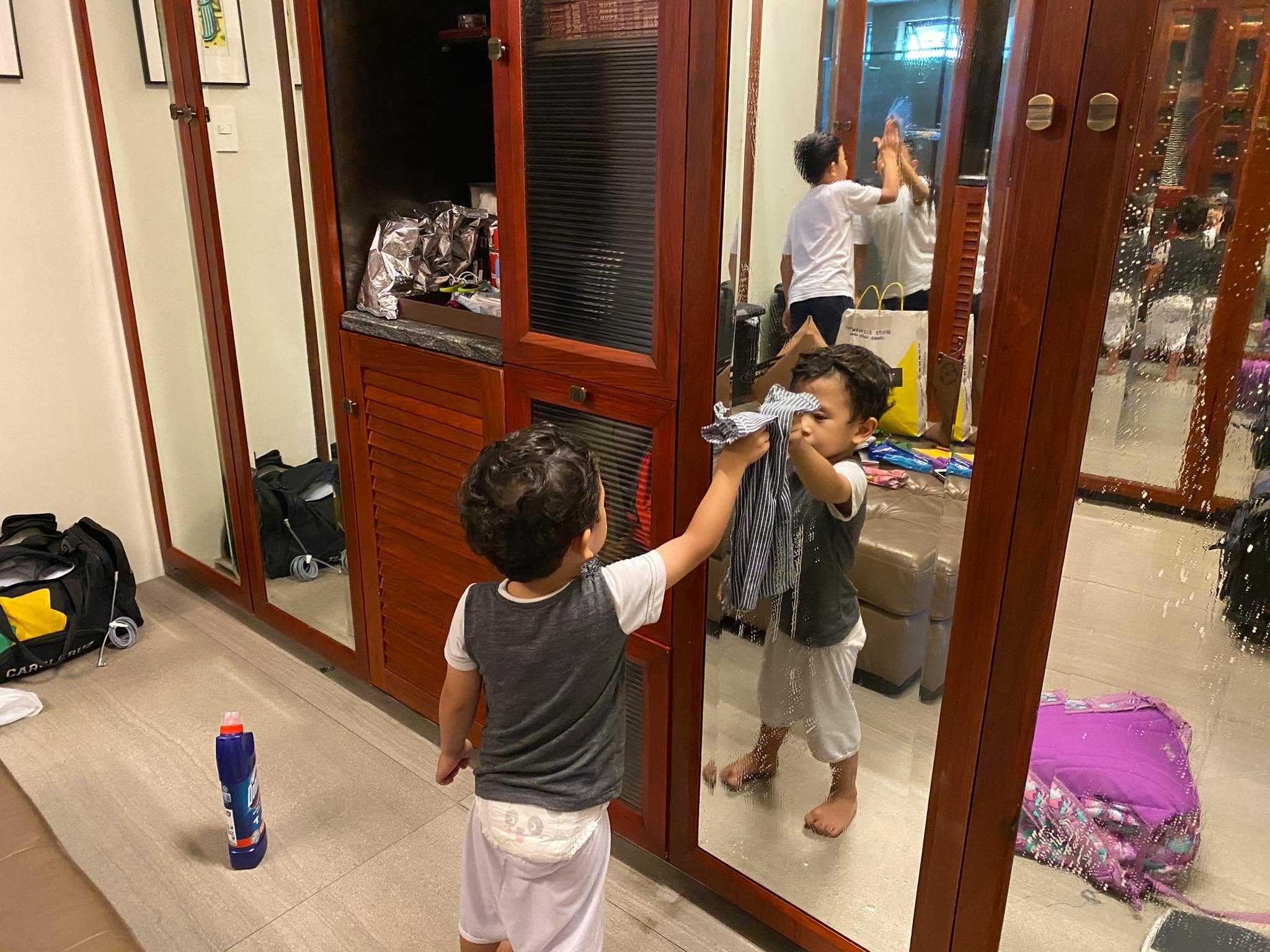 KEEPING CLEAN. Nikki's kids get a hands-on lesson about the coronavirus – and how to avoid it by keeping surfaces clean. Photo courtesy of Nikki Briones Carsi-Cruz 
