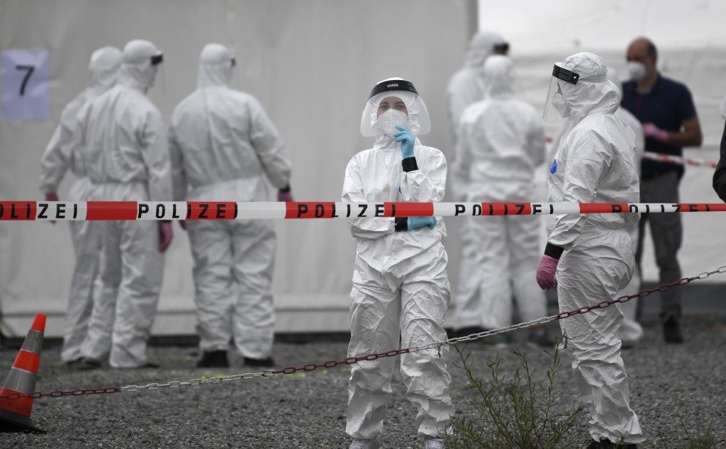 U.S., Europe battle fresh virus surges