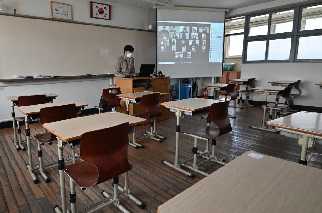 Schools to reopen as virus fears ease in South Korea
