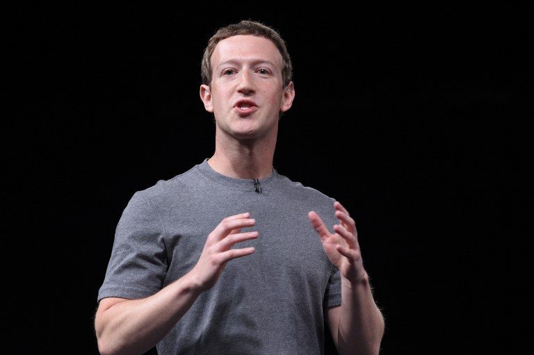 As Facebook scandal mushrooms, Zuckerberg vows to ‘step up’