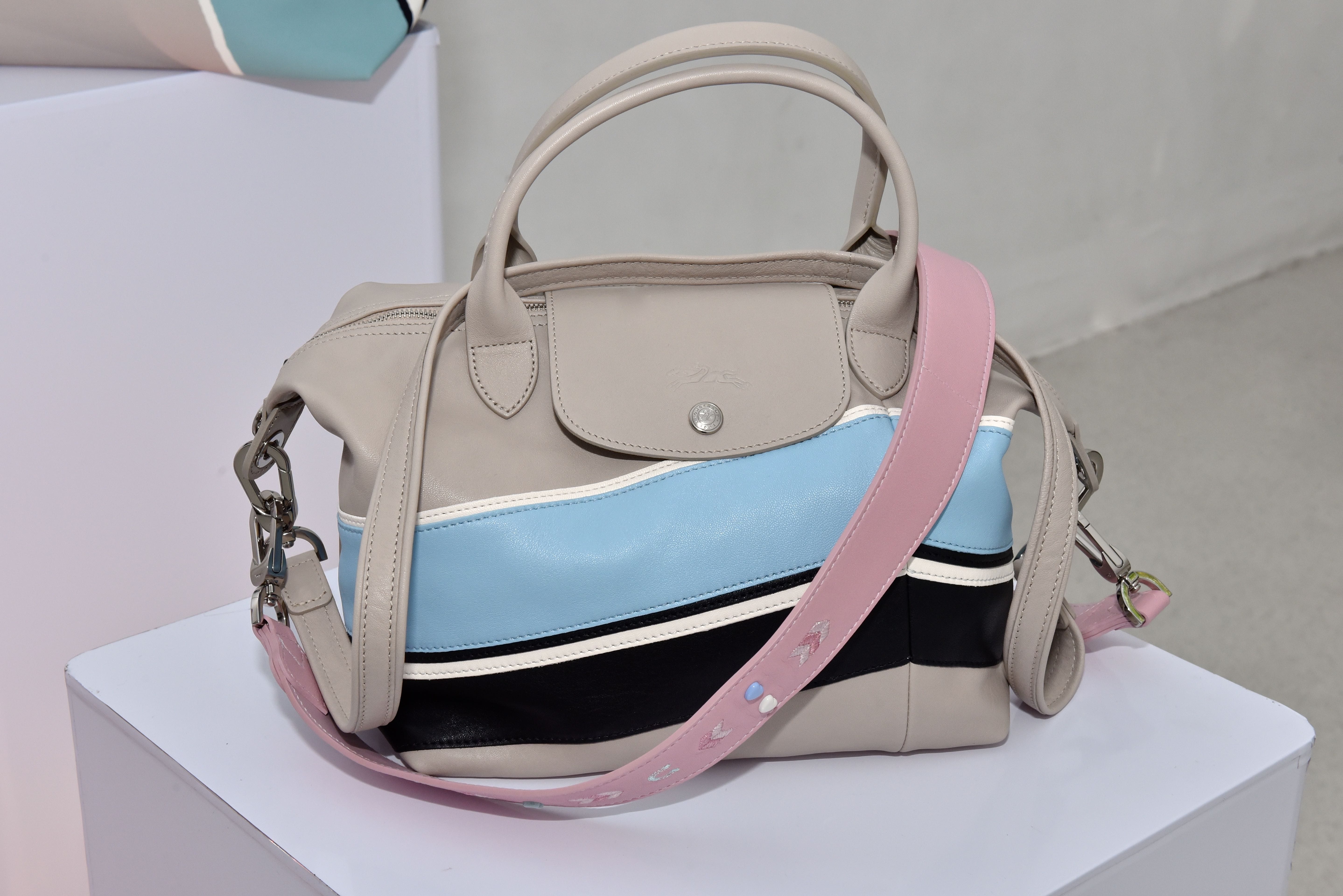 CLASSIC WITH A TWIST. The newest leather Le Pliage Cuir 