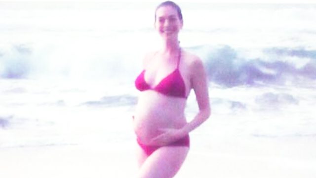 Pregnant Anne Hathaway posts bikini photo