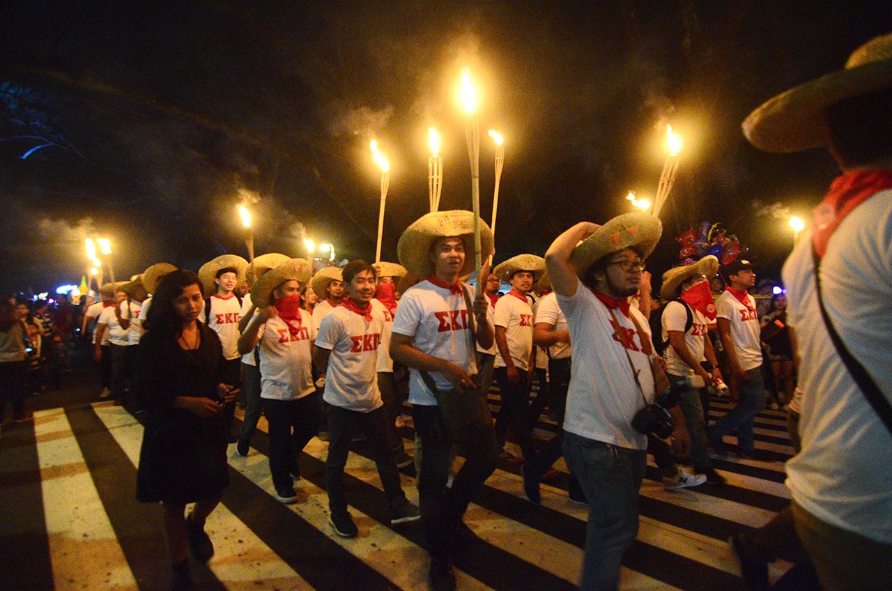 SHOW OF UNITY. Members of SIGMA KAPPA PI Fraternity march together to show unity. Photo by Maria Tan/Rappler   
