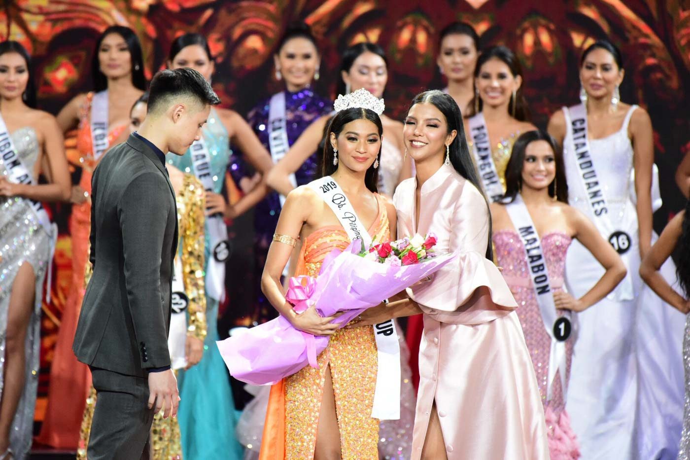 1ST RUNNER-UP. Aya Abesamis is awarded by Miss Intercontinental 2015 1st runner-up Christi McGarry during the coronation night. Photo by Alecs Ongcal/Rappler 