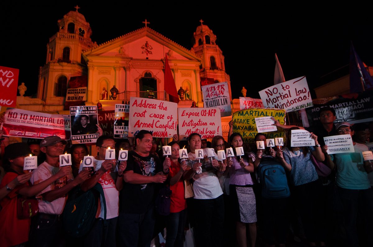NO TO MARTIAL LAW. Groups opposing President Rodrigo Duterte's declaration of Martial Law in Mindanao stage a candle lighting protest in Manila on May 24, 2017. Photo by Rob Reyes/Rappler   