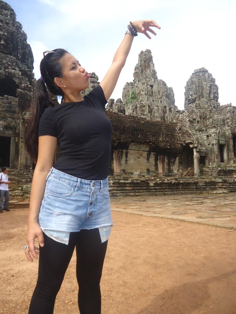 STRIKE A POSE. Having fun at the Angkor Wat, Cambodia