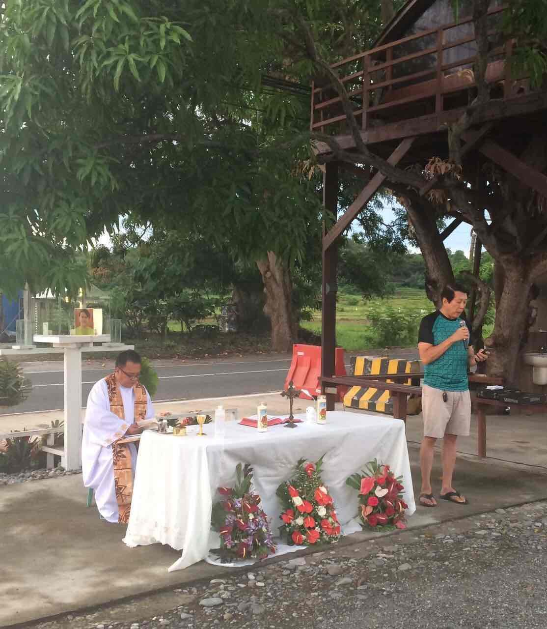 A FATHER'S PROMISE. Fariñas speaks during a Mass held in memory of JR on June 11. Behind Fariñas is the treehouse he made in honor of his late son. Photo courtesy of Fariñas  