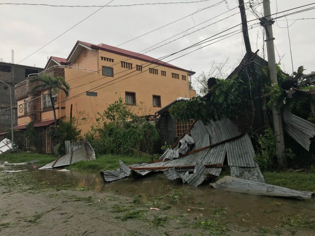 DESTRUCTION. Corrugated iron sheets litter a street in Tuguegarao, Cagayan on September 15, 2018. Photo by Raymon Dullana/Rappler    