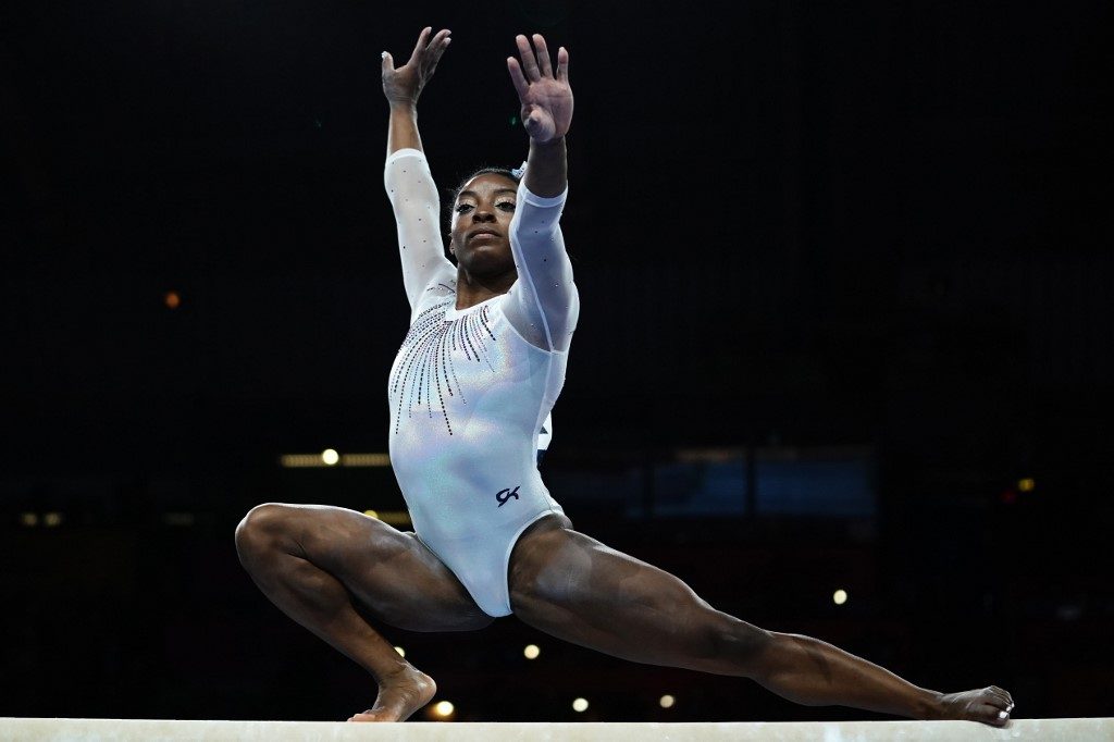 Biles bewildered by own success: ‘How do I do that?’