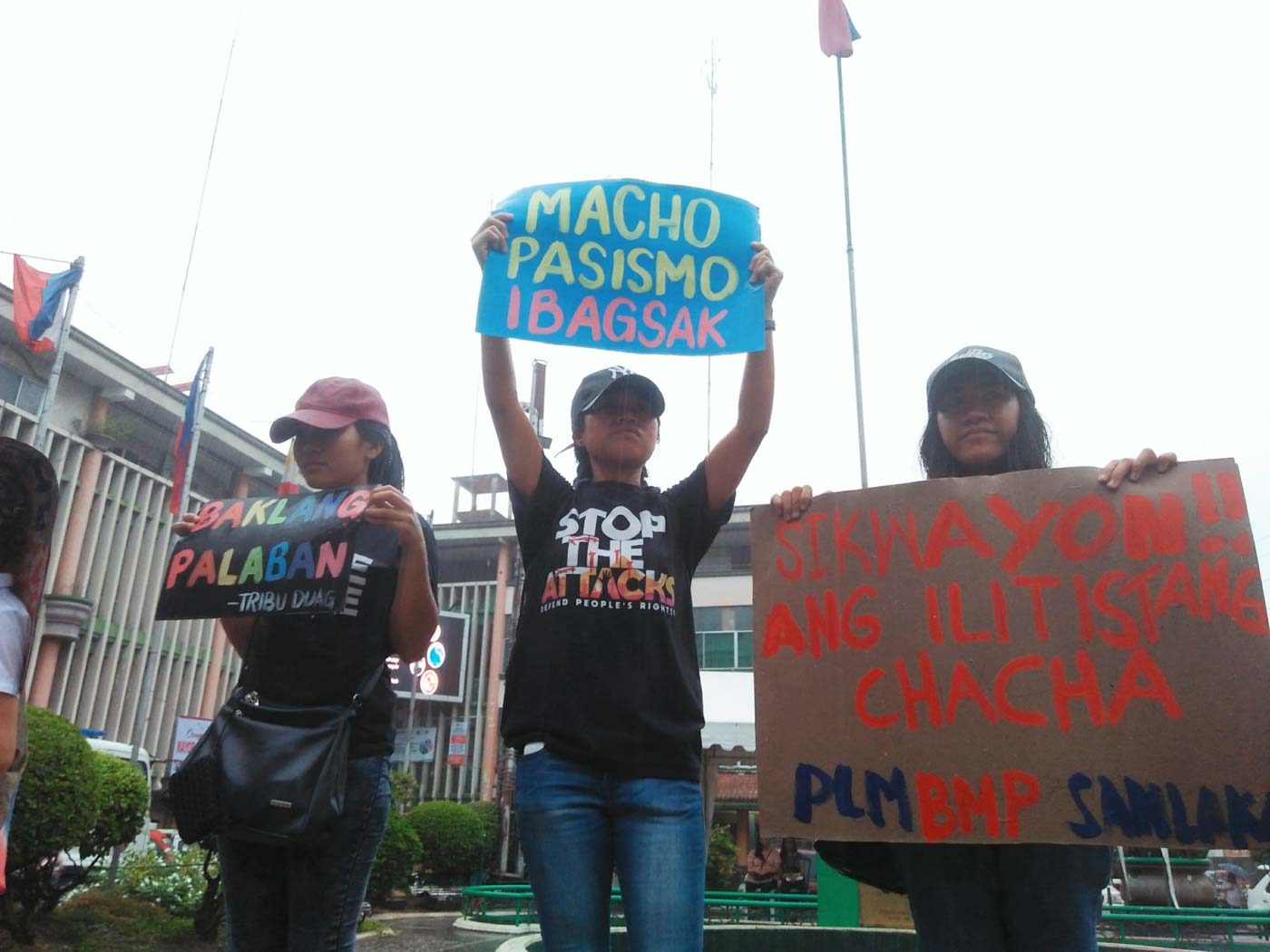 BACOLOD CITY. Youth protesters from environmental, LGBT, and labor youth sectors brave the rain to deliver their 'State of the Youth Address' at the Fountain of Justice, Bacolod City on July 22.  Photo by Krishna Ariola/Rappler 