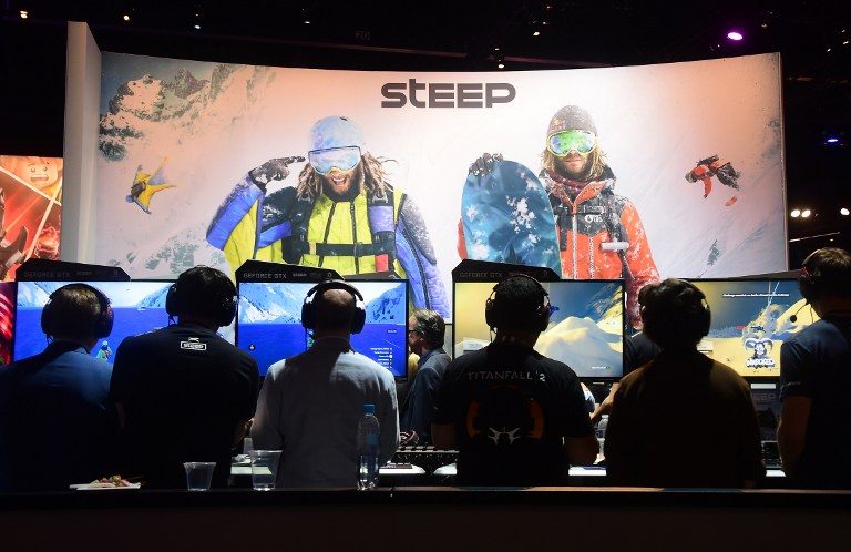 THRILLING ADVENTURES. People play 'Steep' by Ubisoft at the Los Angeles Convention Center during the 2016 Electronic Entertainment Expo (E3) in Los Angeles, California on June 14, 2016. Photo by Frederic J. Brown/AFP 
