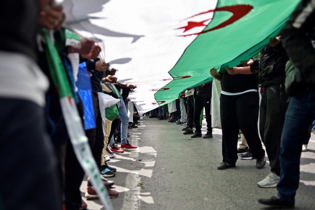 Algeria protests defy police to keep up pressure on regime