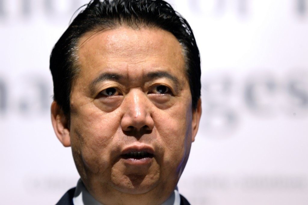 China charges ex-Interpol chief with accepting bribes