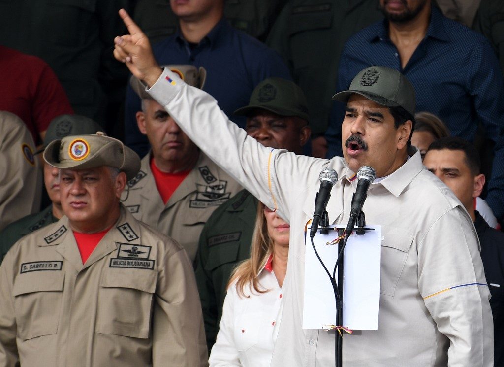 Maduro rallies military as opposition appeals to troops