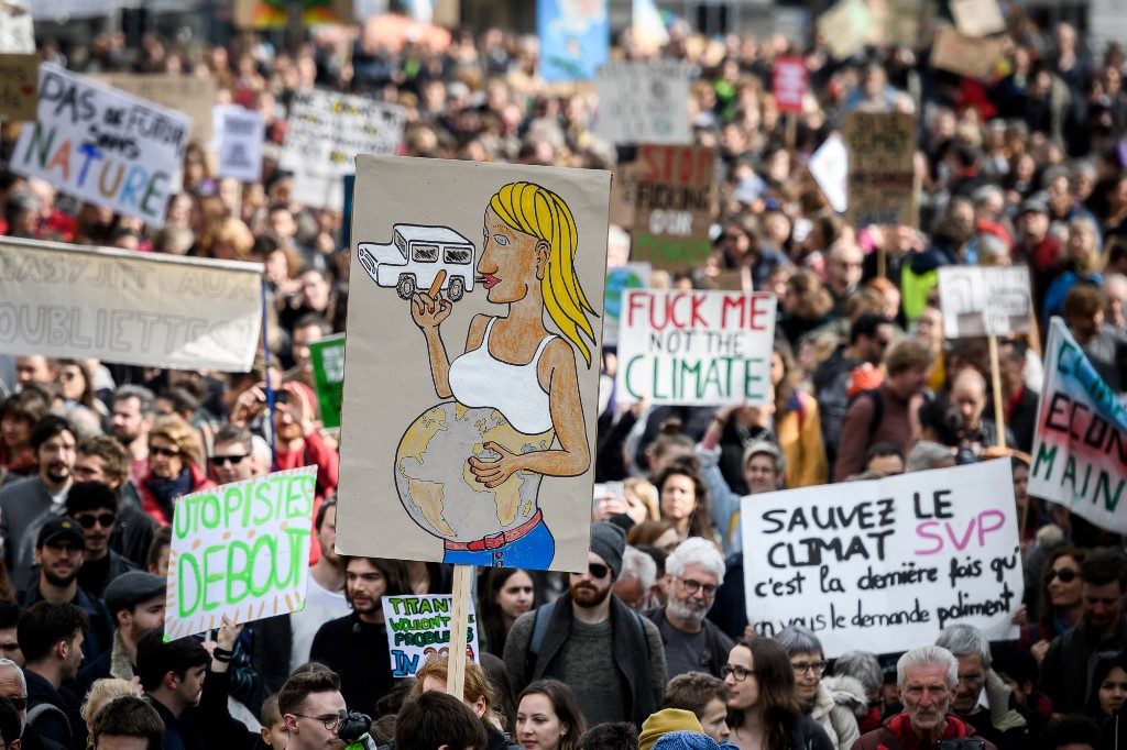 Tens of thousands protest climate change in Switzerland