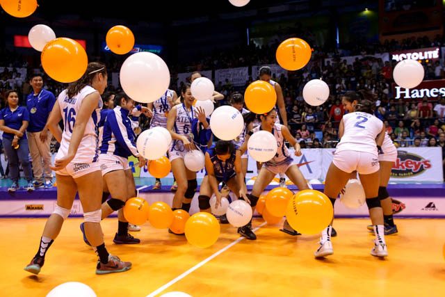 After being awarded first runner-up, the Lady Eagles decide to have fun and play with the balloons. Photo by Czeasar Dancel/Rappler 