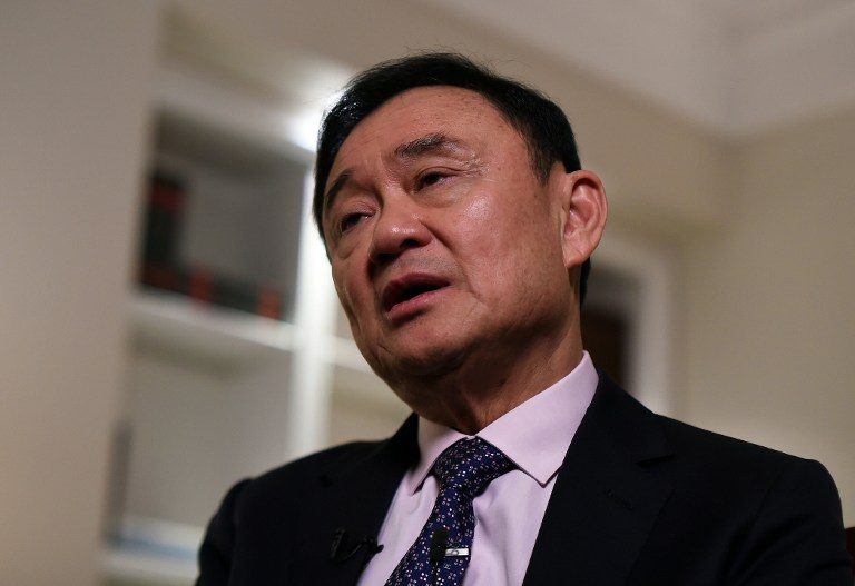 Toppled Thai party meets for Thaksin Skype address