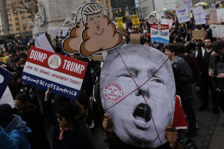Anti-Trump protesters rally in New York, block Arizona road
