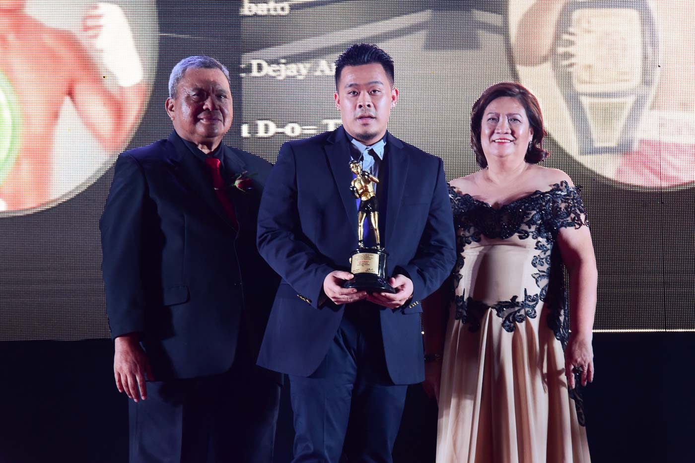 Jim Claude Manangquil of Sanman Promotions is presented with the Promoter of the Year award. 