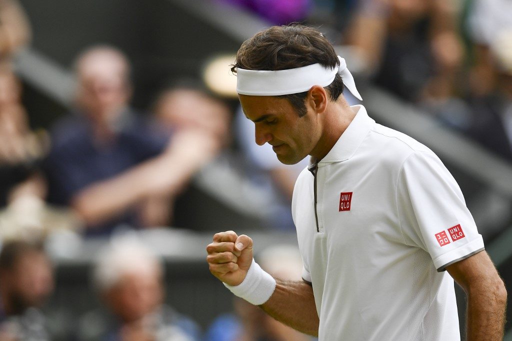 Federer racks up 100th Wimbledon match, Nadal next