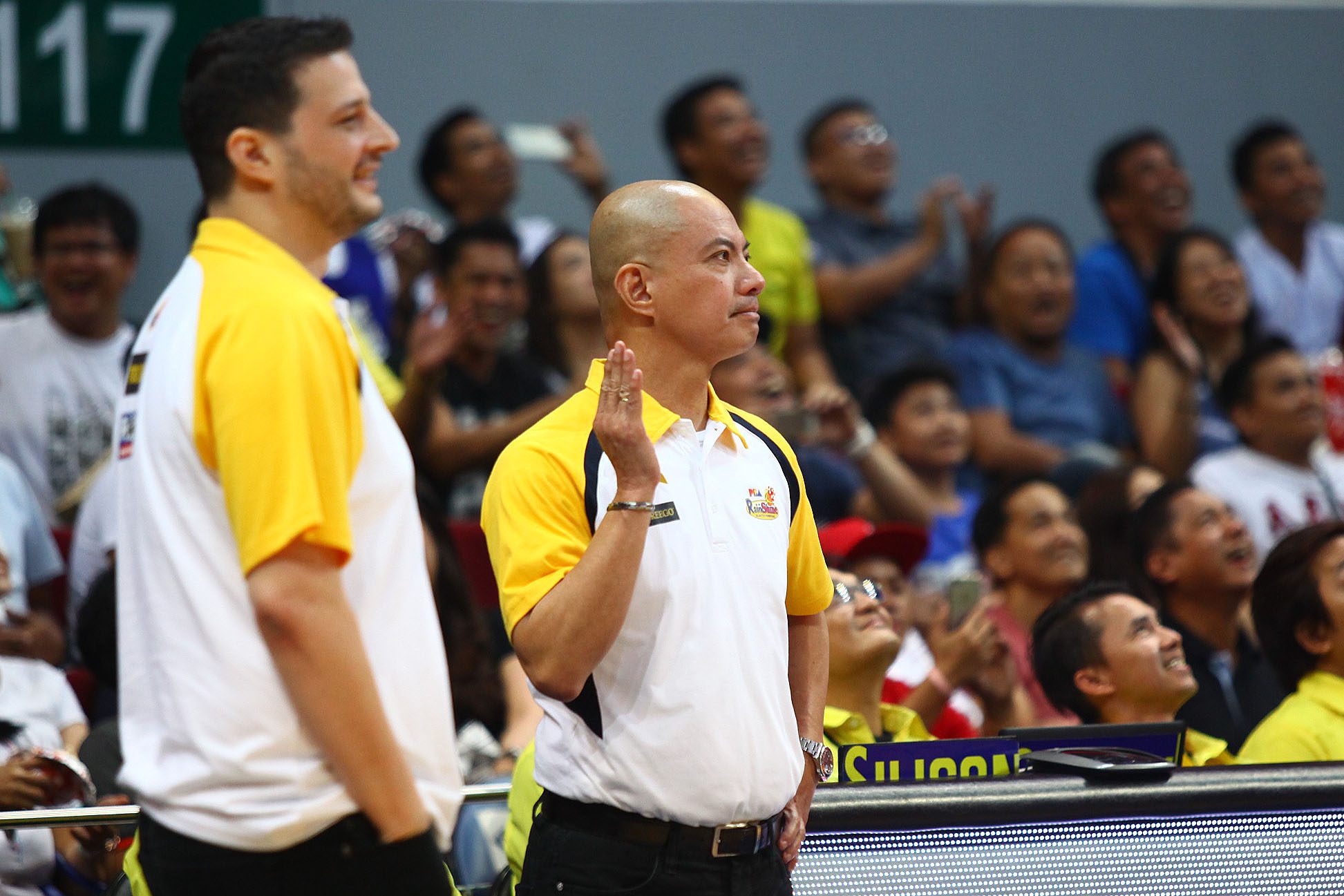 PABEBE WAVE. Rain or Shine coach Yeng Guiao sparks laughter as he did the popular "pabebe wave" after the scuffle with Chris Ross. The hand gesture was made popular by the "AlDub" love team. Photo by Josh Albelda/Rappler 