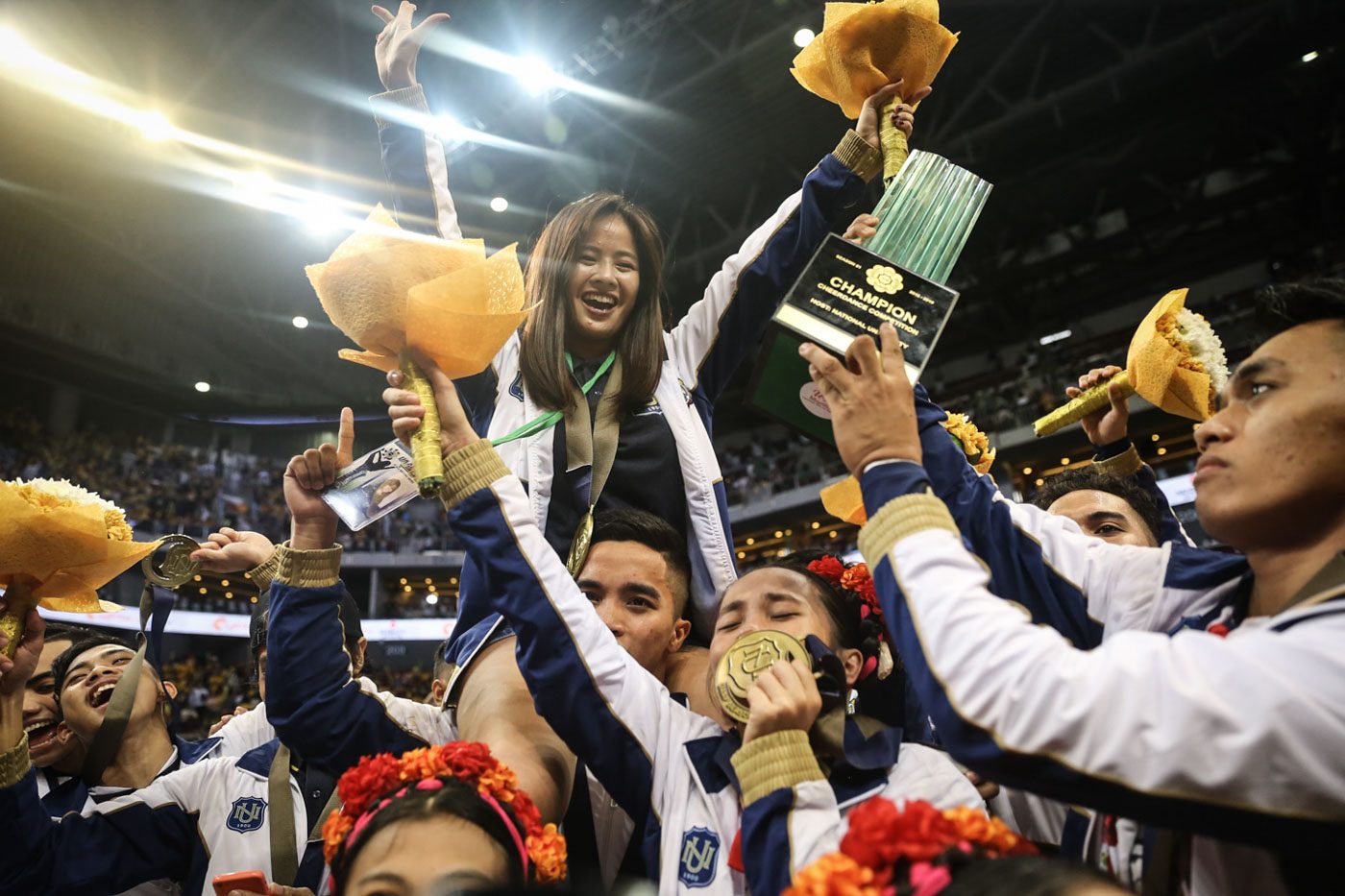 WOMAN OF THE DAY. NU Pep Squad head coach Ghicka Bernabe leads National University to a 5th title. Photo by Josh Albelda/Rappler  