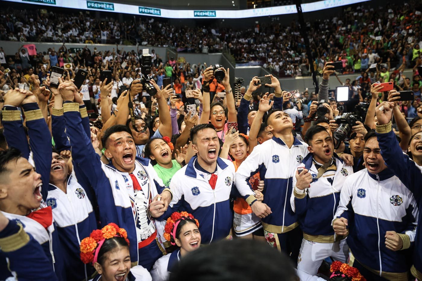 EMOTIONAL. The NU Pep Squad relishes the feeling of returning to the top of the podium after crashing out of the top 3 last year. Photo by Josh Albelda/Rappler  