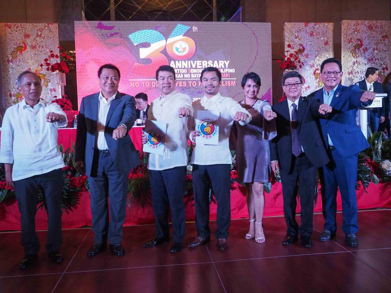 RULING PARTY. PDP vice chair Alfonso Cusi, PDP Sec. Gen. Pantaleon Alvarez, PDP Pres. Koko Pimentel, Sen. Manny Pacquiao, Usec. Astravel Naik, Justice Sec. Vitaliano Aguirre II and Atty. Raul Lambino flash the PDP fist sign after swearing in of Pacquiao as PDP regional president for Region 12. Photo courtesy of House of Representatives Media Bureau
 