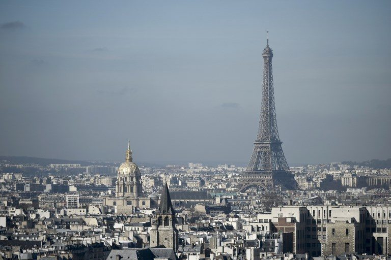 Eiffel Tower evacuated after climber spotted on monument