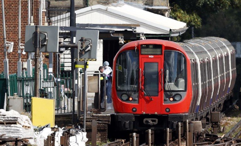 Manhunt for London bomber as threat level raised