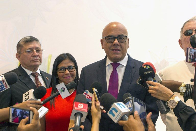 Venezuela rivals hold exploratory talks on crisis