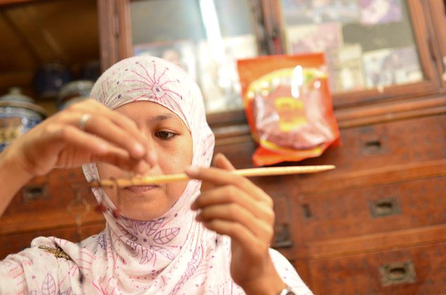 IN PHOTOS: Indonesian integration in a medicine shop