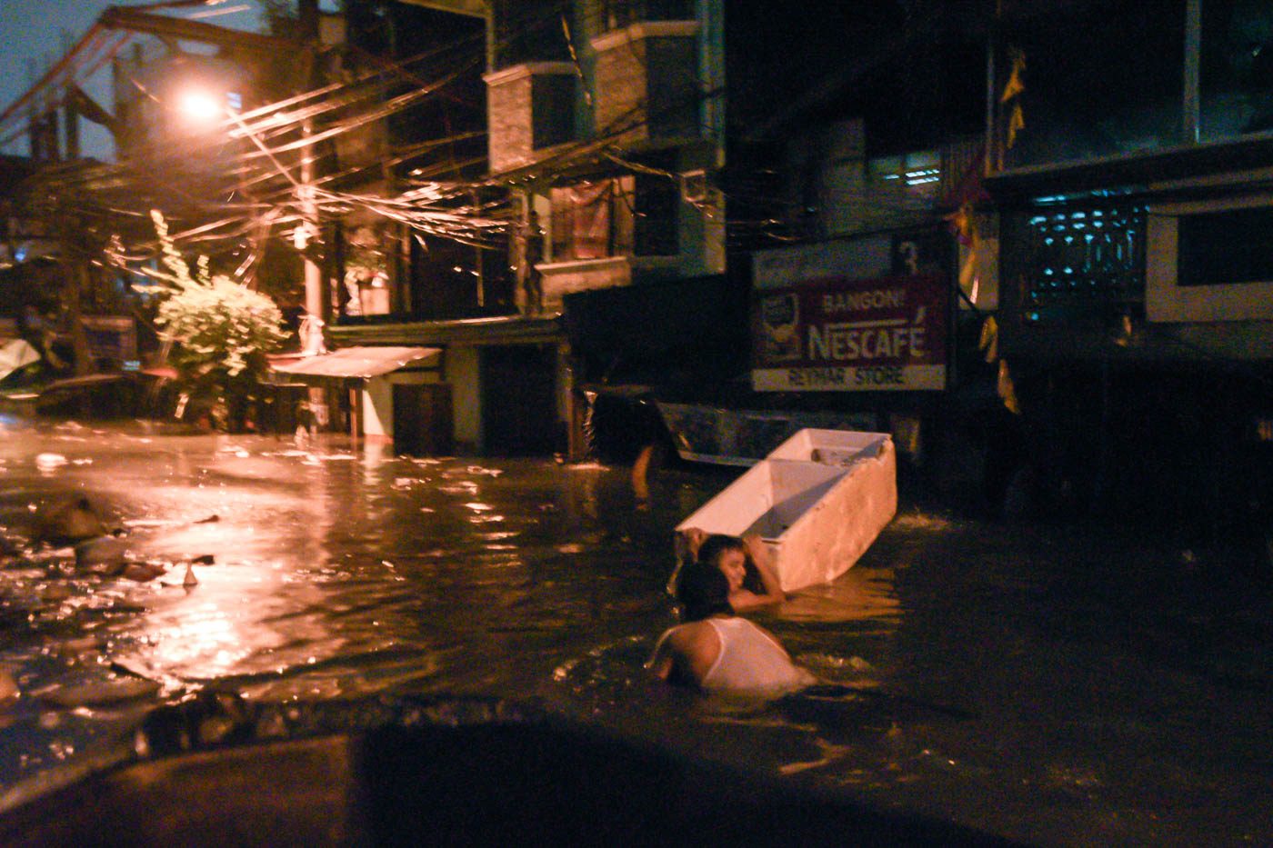 FLOODED. 4 to 5 meter-high flood waters inundate homes in Quezon City due to heavy rains caused by the southwest monsoon on August 11, 2018. Photo by LeAnne Jazul/Rappler 