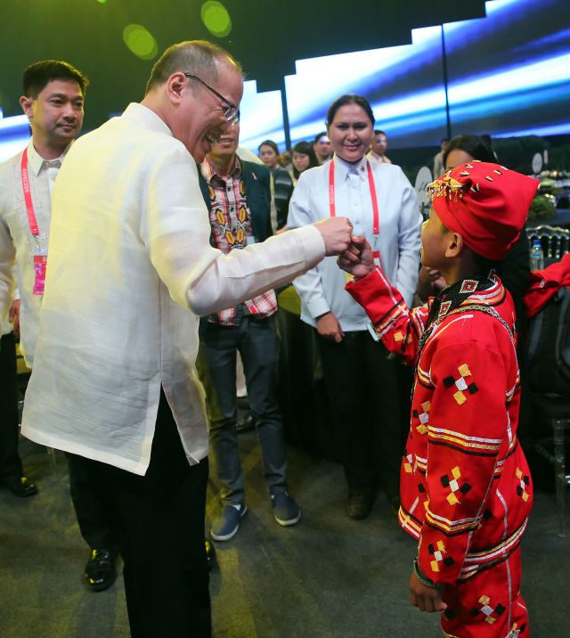FIST BUMP. President Benigno Aquino III with 'The Voice Kids 2' contestant Reynan dal Anay. Photo by Gil Nartea, Malacanang Photo Bureau 