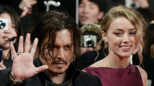 Amber Heard faces charges over bringing dogs Down Under
