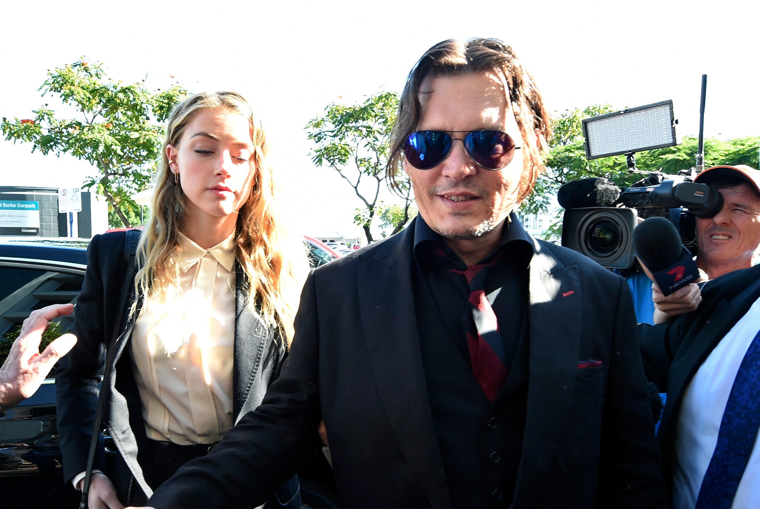 JOHNNY DEPP AND AMBER HEARD. Johnny Depp  and his wife, actress Amber Heard arrive at Southport Magistrates Court on the Gold Coast on April 18. Photo by Dave Hunt Australia and New Zealand Out/EPA   