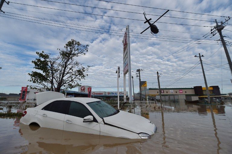 Japan in urgent search for missing after deadly floods