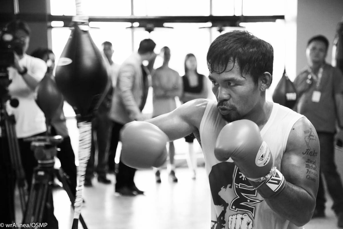 SENATE FIRST. Pacquiao says his training won't interfere with his job in the Senate. Photos by Wendell Alinea/OSM 