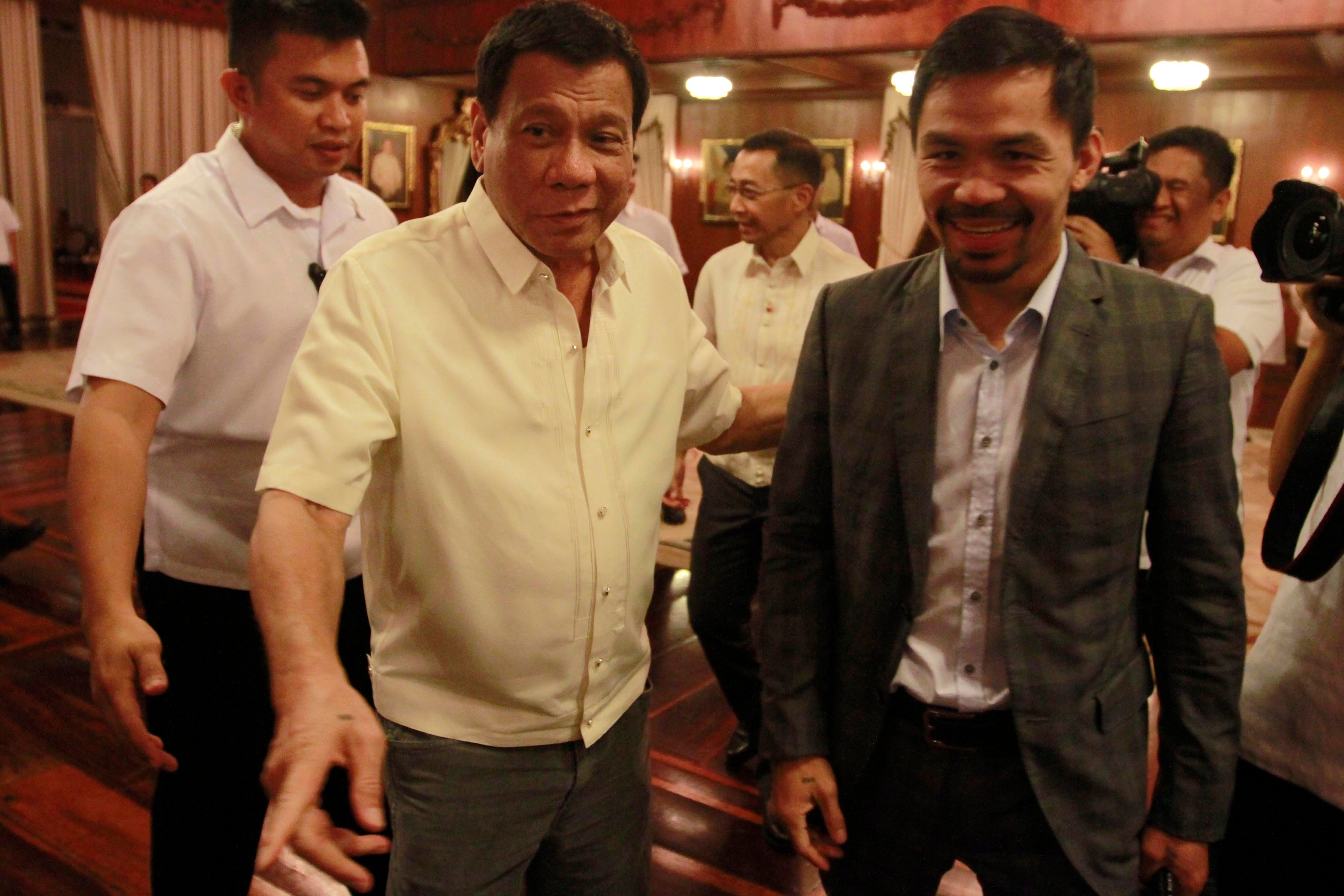 ONE-ON-ONE MEETING. President Rodrigo Duterte leads Senator Manny Pacquiao to the Study Room of Malacañang Palace on August 1, 2016. Photo by Rey Baniquet/PPD 