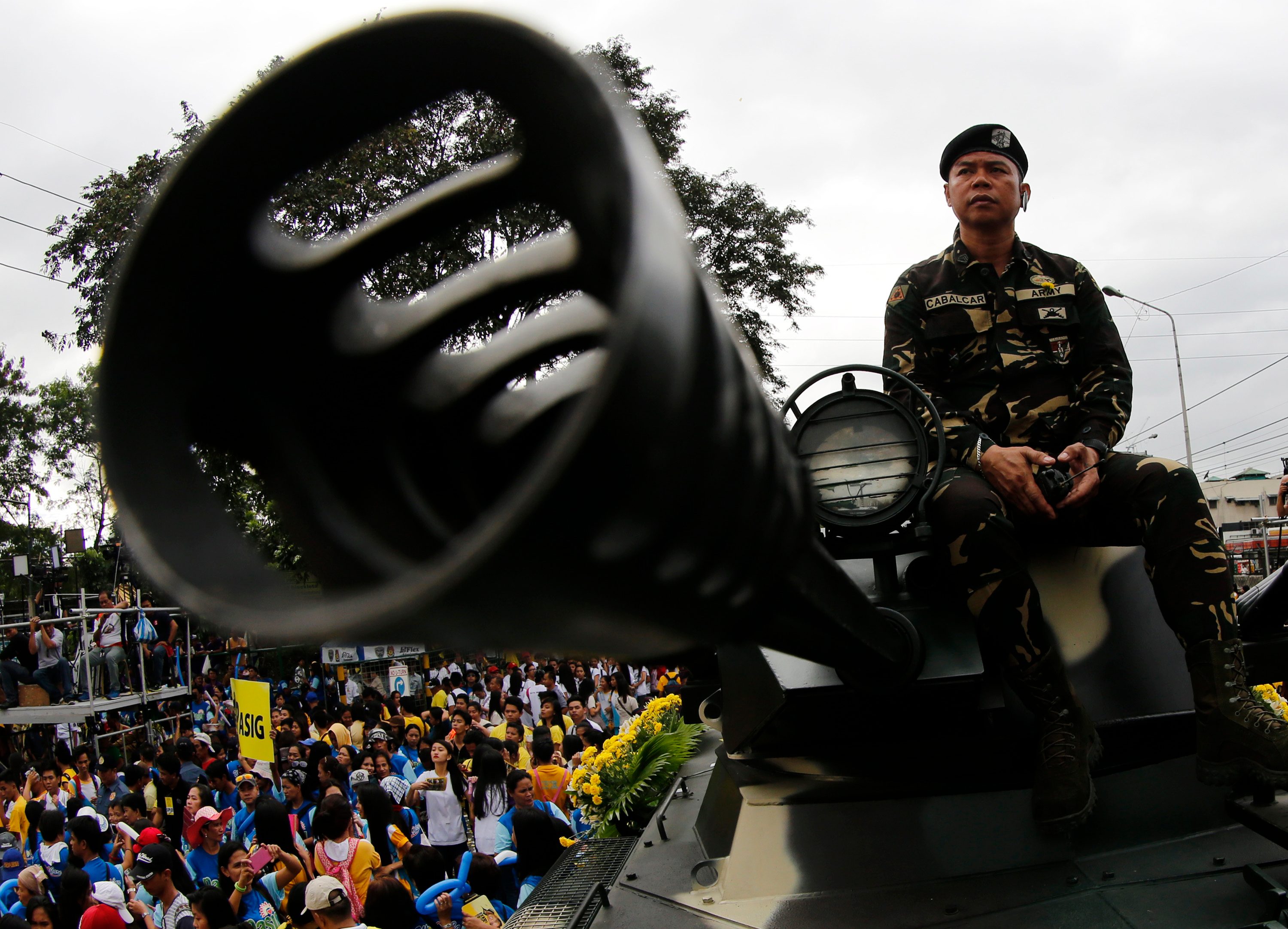 30 YEARS LATER. In a re-enactment of the People Power Revolution of 1986, a Filipino soldier sits on top of a military tank during the 30th anniversary of the fall of the dictatorship of Ferdinand Marcos, at the People Power monument in Quezon City, on February 25, 2016. Photo by Francis Malasig/EPA 
