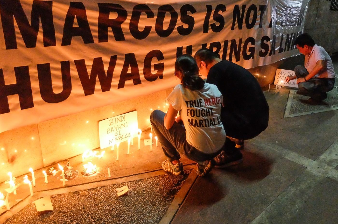 VIGIL. Supporters, friends, and families of Martial Law victims gather at the Loreto Church on August 30, 2016 to light candles and offer prayers ahead of the start of the Supreme Court oral arguments on the burial of former President Ferdinand Marcos at the Libingan ng mga Bayani. Photo by LeAnne Jazul/Rappler  