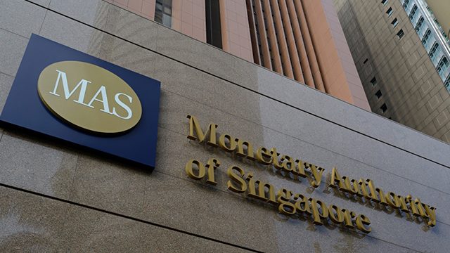 Singapore eases monetary policy, avoids recession