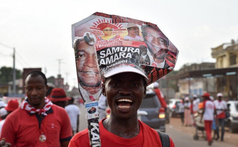 PRESIDENTIAL CAMPAIGN. A supporter of Sierra Leone's All People's Congress presidential candidate Samura Kamara at  a campaign rally on March 5, 2018, in Makeni, northern Sierra Leone. Photo by Issouf Sanogo/AFP   