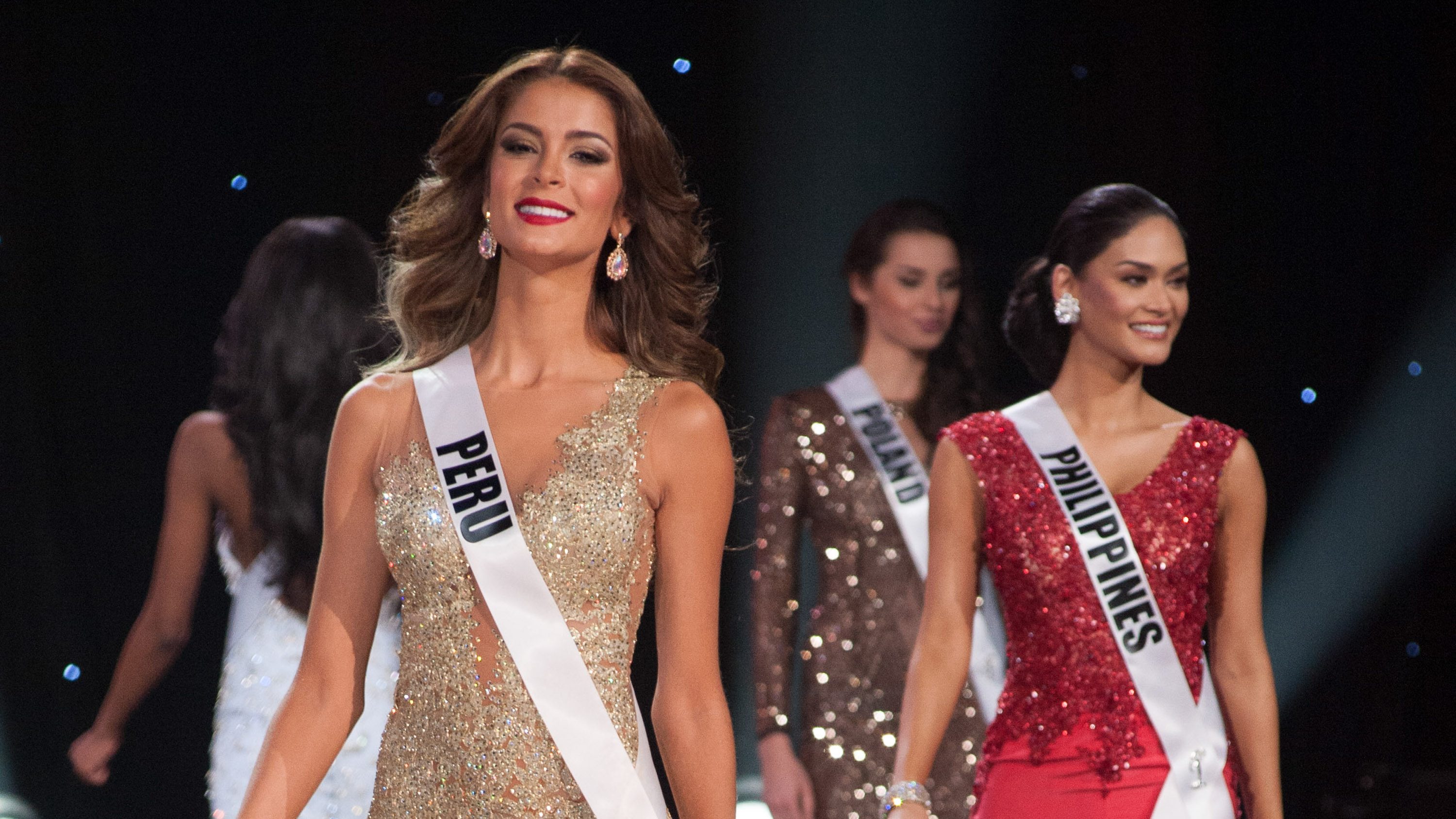 PRELIMINARIES 2015. Miss Peru 2015 Laura Spoya and Miss Philippines Pia Wurtzbach compete on stage in their evening gowns during the 2015 Miss Universe Preliminary Show at Planet Hollywood Resort & Casino on December 16, 2015. The Miss Universe semifinalists are chosen during the pageant's preliminary round. File photo from HO/The Miss Universe Organization 