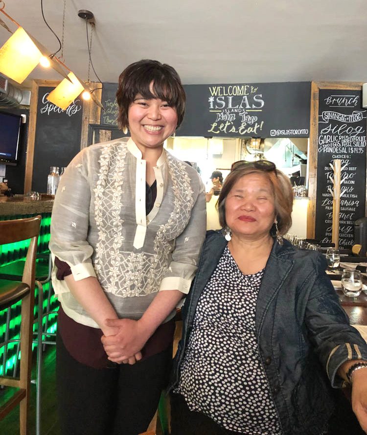 PINOY AND PROUD. Food writer and podcast host Nastasha Alli and award-winning poet Patria Rivera at the Toronto launch of the cookbook 'The New Filipino Kitchen' on June 2. Photo by Marites Sison  