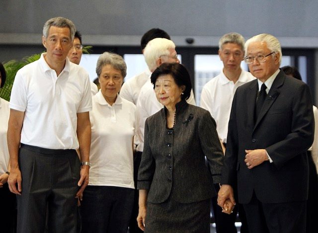 GRIEVING LEADERS. Prime Minister of Singapore Lee Hsien Loong (L) and his wife Ho Ching (2-L) watch as President of Singapore Mr Tony Tan Keng Yam (R) and his wife Mary Tan (2-R) take their leave after viewing the body of the late Mr Lee Kuan Yew which lies in state at the Parliament House in Singapore, 25 March 2015. Wallace Woon/EPA 