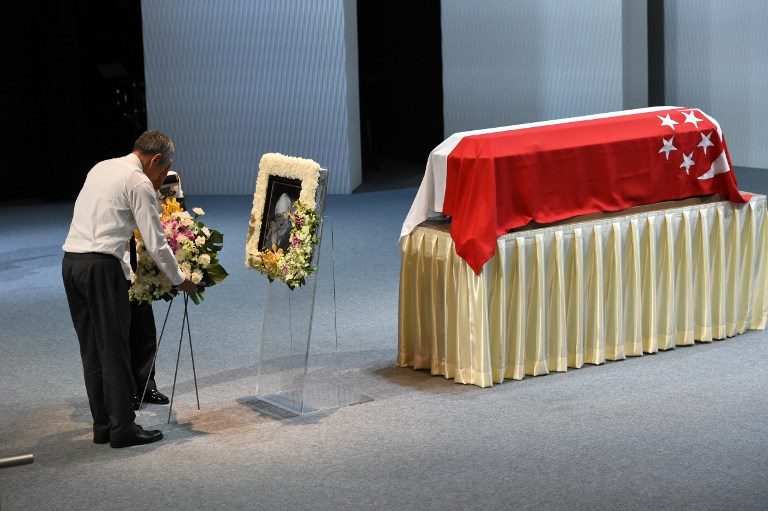 A WREATH FOR LEE. Singapore's Prime Minister Lee Hsien Loong lays a wreath during the funeral service for Singapore's late former prime minister Lee Kuan Yew in Singapore on March 29, 2015. Roslan Rahman/AFP 